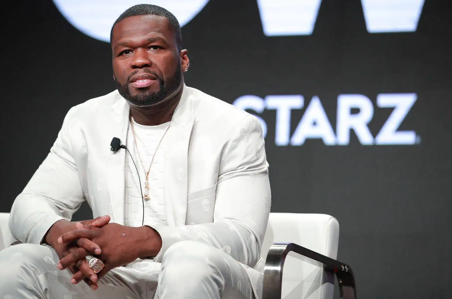 50 cent rapper in white suite